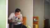 A man studying at a computer