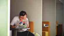 A man studying at a computer